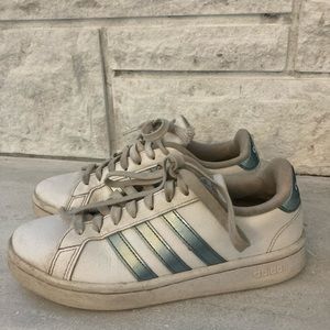 Adidas tennis shoes.